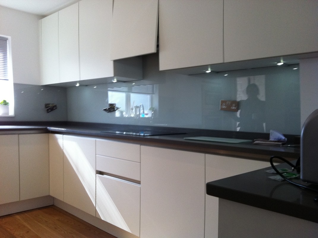 Grey glass kitchen splashback with LED lighting in Reading